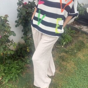 Pantalon femme en gaze de coton, coupe fluide et confortable, taille élastique avec cordon, tissu léger et respirant.