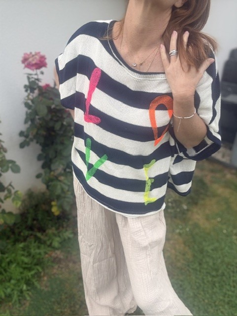 Pantalon femme en gaze de coton, coupe fluide et confortable, taille élastique avec cordon, tissu léger et respirant.
