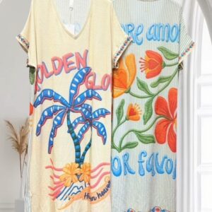 Robe femme Glow imprimée avec fils de lurex dorés, coupe fluide et légère, fabrication Italienne, style féminin et tendance.
