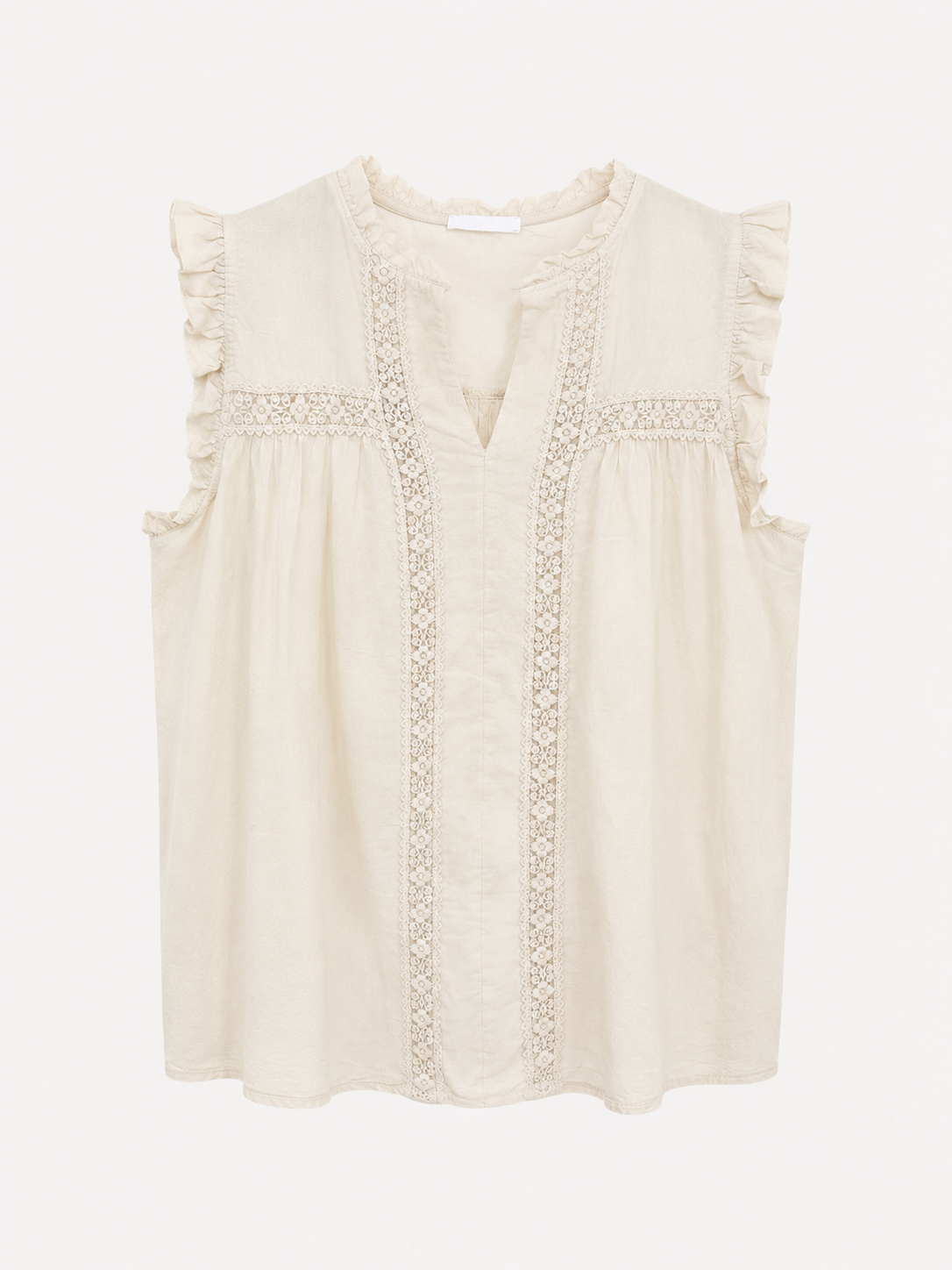Blouse femme Jessica avec dentelle et volants aux épaules, coupe fluide et col en V.