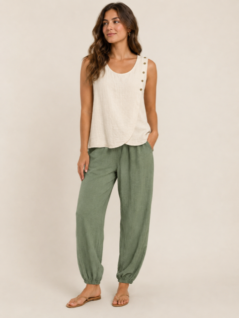 Pantalon femme Aladin kaki à coupe ample avec taille et chevilles élastiquées, poches latérales et style décontracté.