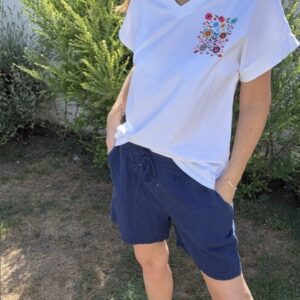 Short gaze de coton femme avec taille élastiquée et lien, léger, confortable et idéal pour un look d'été.